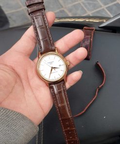 Dây da nâu đất khâu máy đồng hồ Tissot Carson T085.407.36.011.00